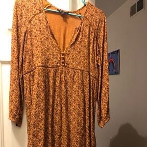 Mustard colored floral shift dress.